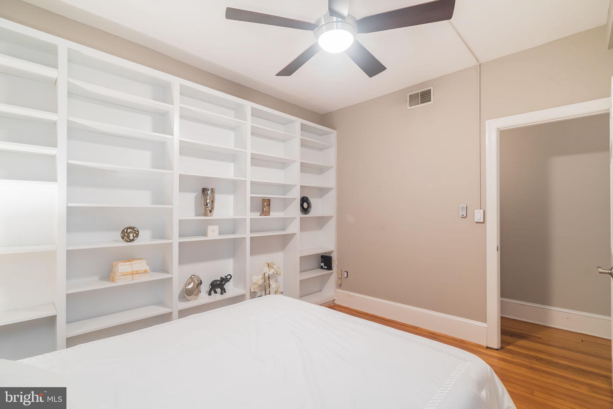 1754 Willard Street Northwest, Unit 2 Washington, DC 20009 - Photo 15 of 28 a bedroom with a bed and a window