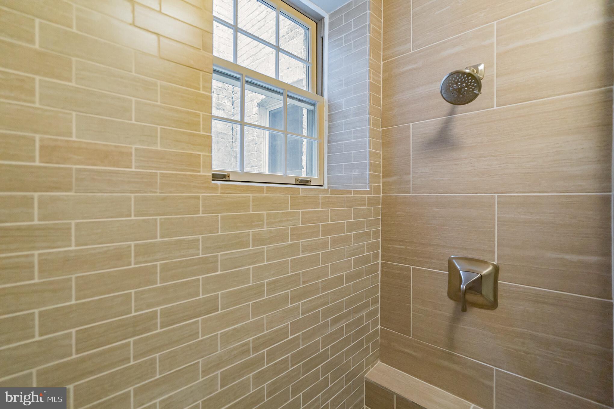 1754 Willard Street Northwest, Unit 2 Washington, DC 20009 - Photo 17 of 28 a bathroom with a shower