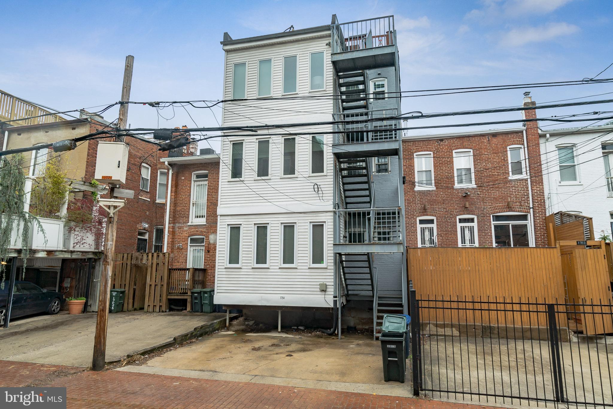 1754 Willard Street Northwest, Unit 2 Washington, DC 20009 - Photo 21 of 28 a front view of a building with a glass windows