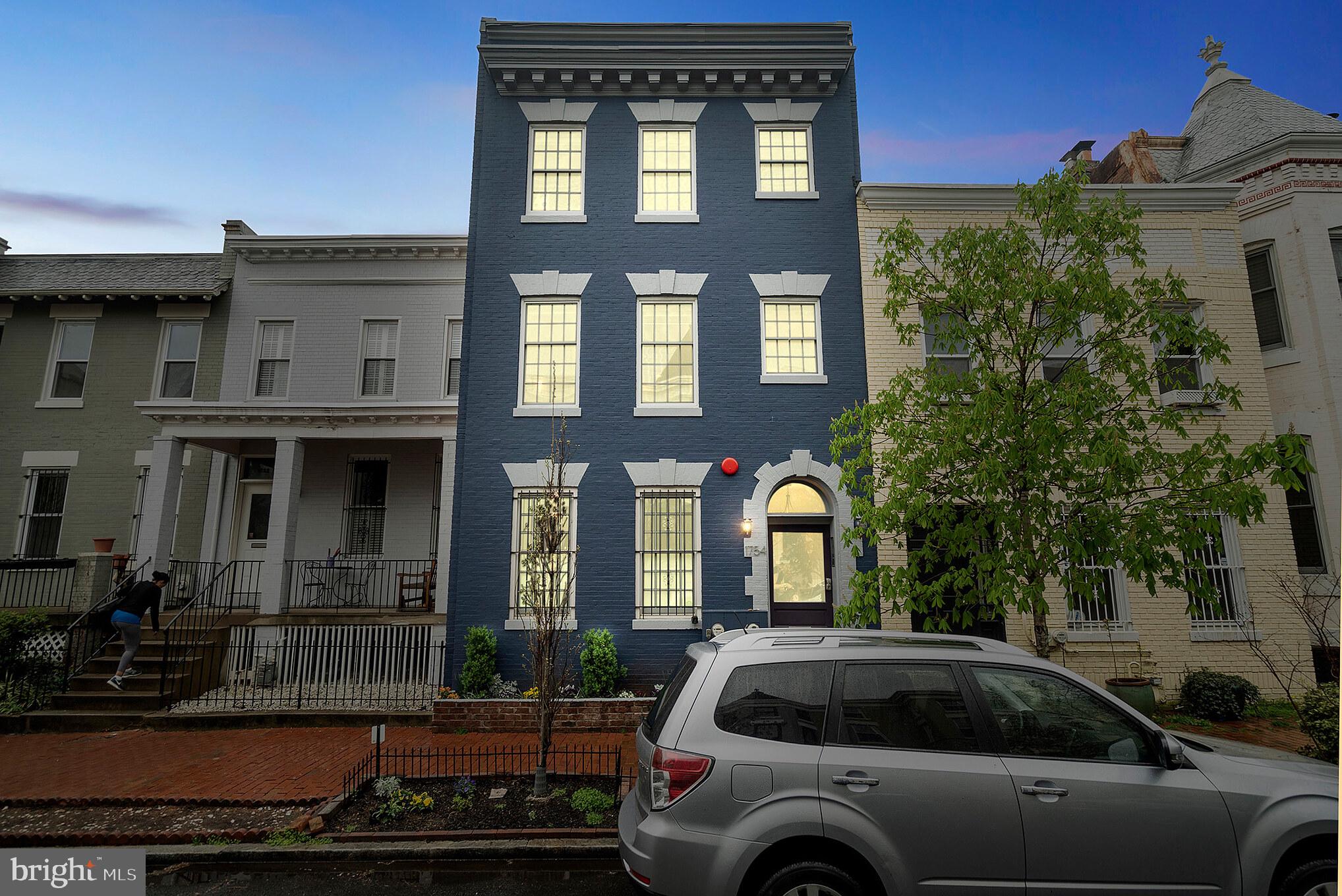 1754 Willard Street Northwest, Unit 2 Washington, DC 20009 - Photo 22 of 28 a view of a car parked in front of a building