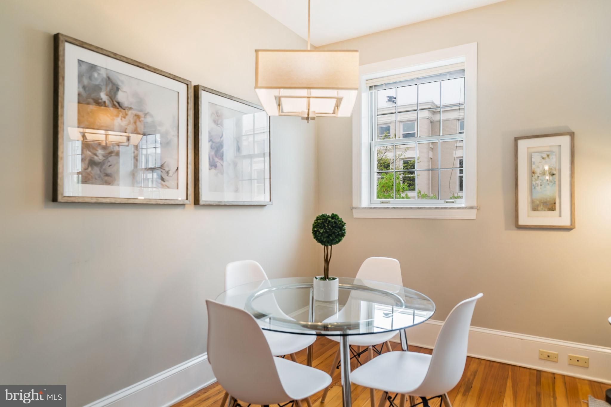 1754 Willard Street Northwest, Unit 2 Washington, DC 20009 - Photo 4 of 28 a dining room with furniture and window