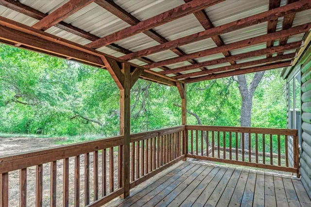 a view of porch with wooden floor in outdoor space