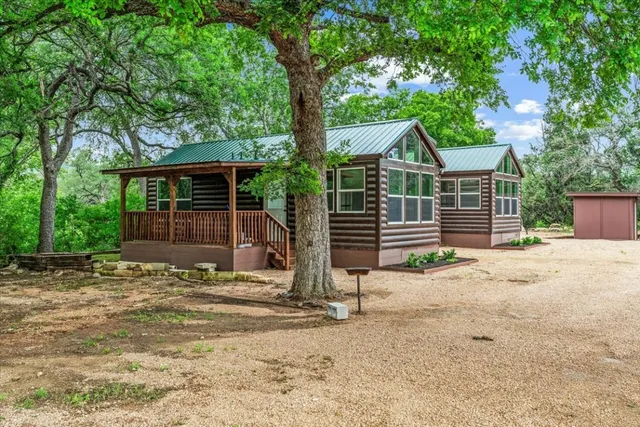 a house with trees in the background