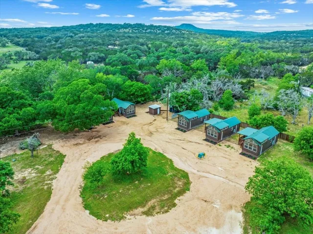 a view of a garden with a patio