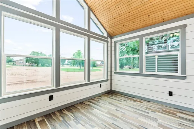 a view of a room with a large window