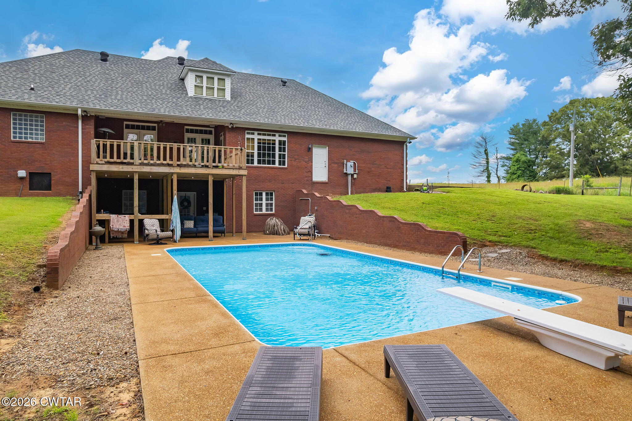 4320 Timberlake-Wildersville Road Lexington, TN 38351 - Photo 2 of 58 a view of a house with swimming pool and a yard