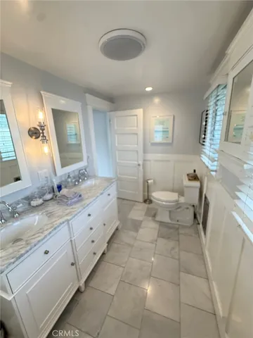 a view of bathroom with a sink and yard