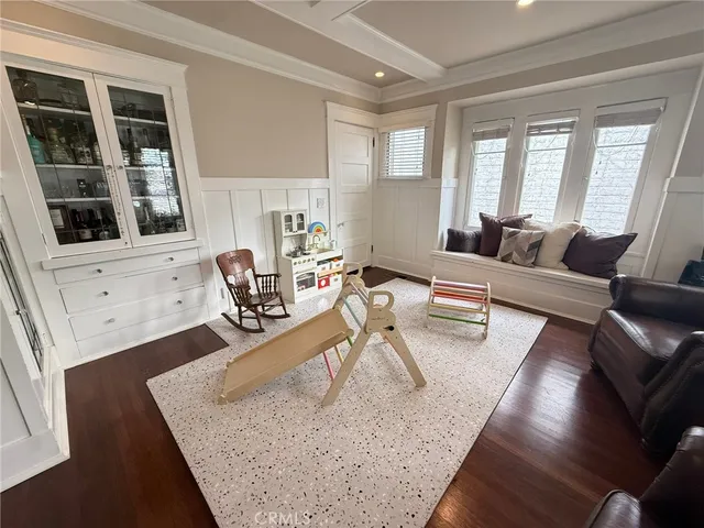 a view of a living room and dining room