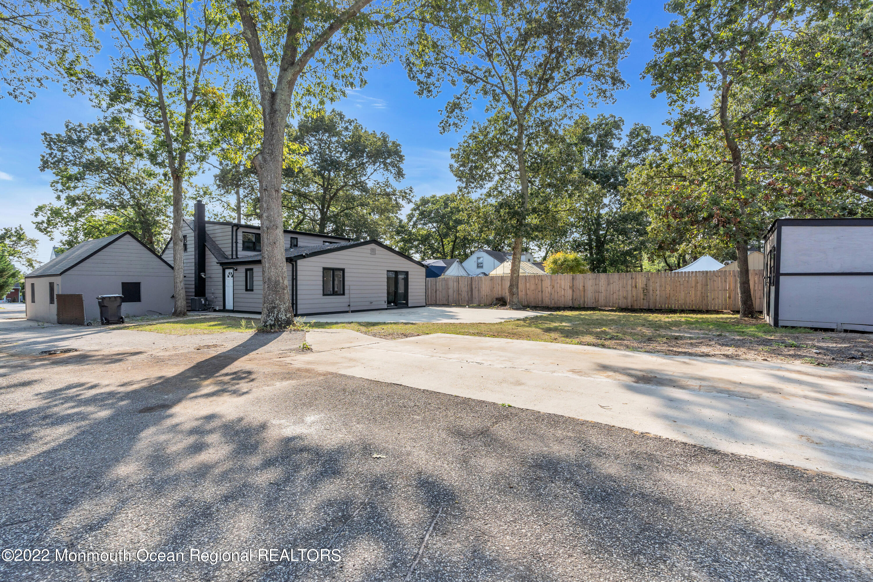512 Carroll Fox Road Brick, NJ 08724 - Photo 54 of 63 a house with trees in the background