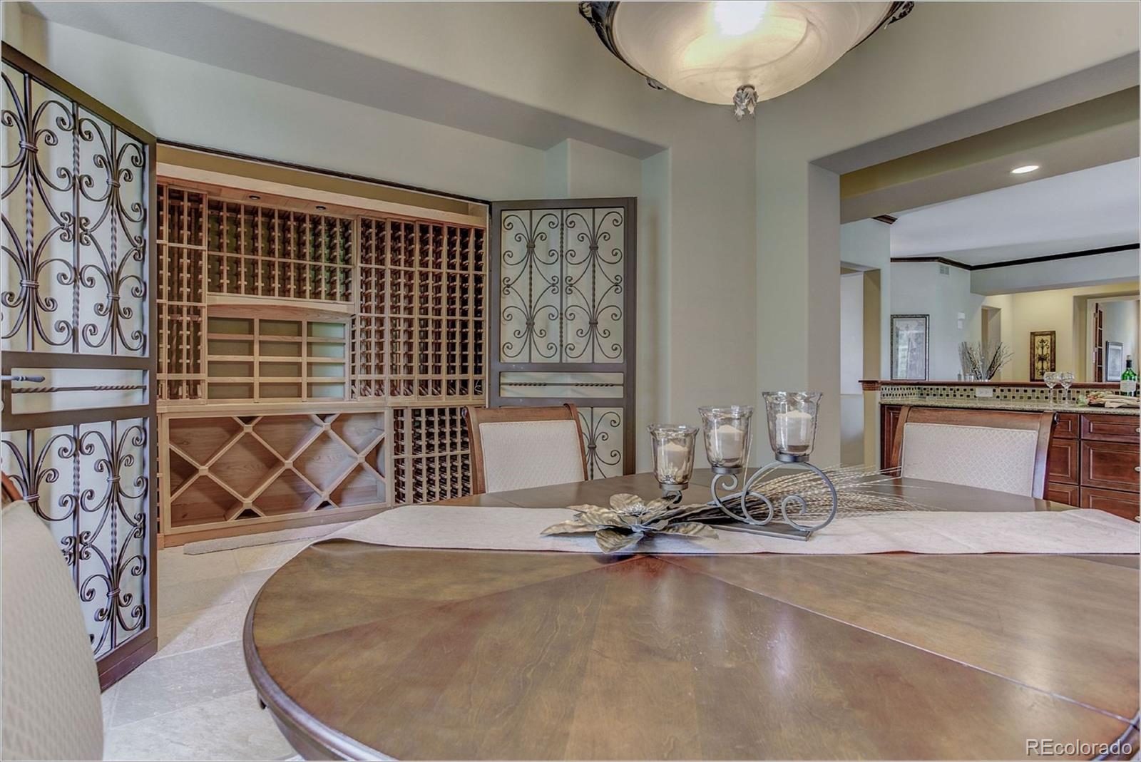 9061 Hunters Way Highlands Ranch, CO 80129 - Photo 16 of 33 a view of a room with gym equipment