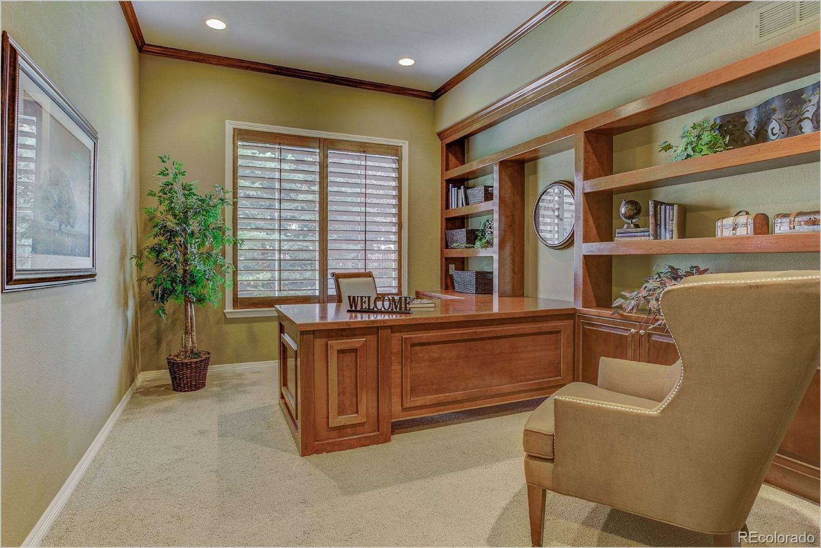9061 Hunters Way Highlands Ranch, CO 80129 - Photo 18 of 33 a room with furniture and window