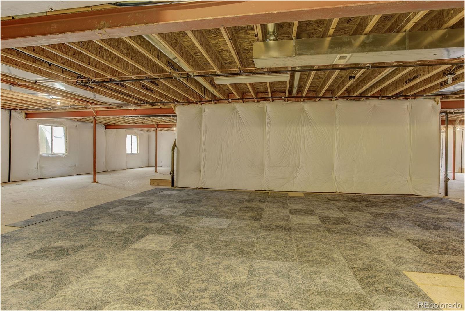 9061 Hunters Way Highlands Ranch, CO 80129 - Photo 28 of 33 a view of an empty room