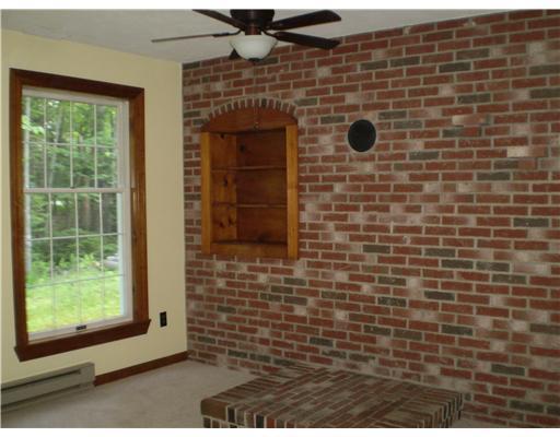 640 River Road Brunswick, ME 04011 - Photo 4 of 10 Living Room. In the living room is a...