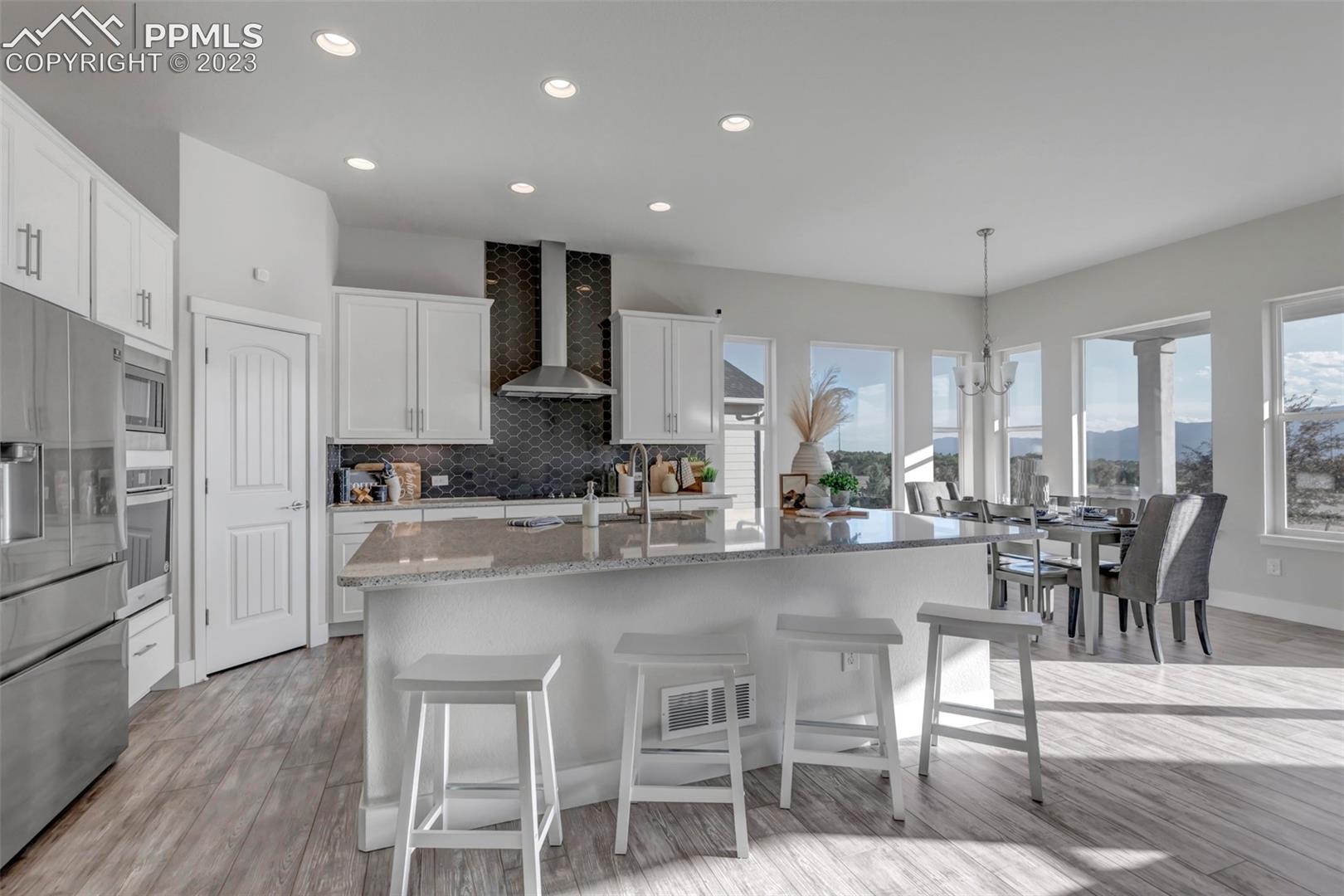 3259 Red Cavern Road Colorado Springs, CO 80908 - Photo 9 of 36 Kitchen and island