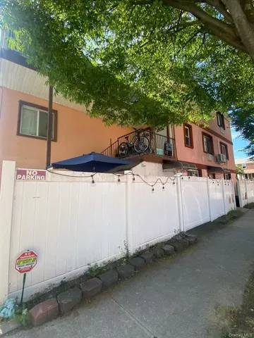 a house view with a backyard space