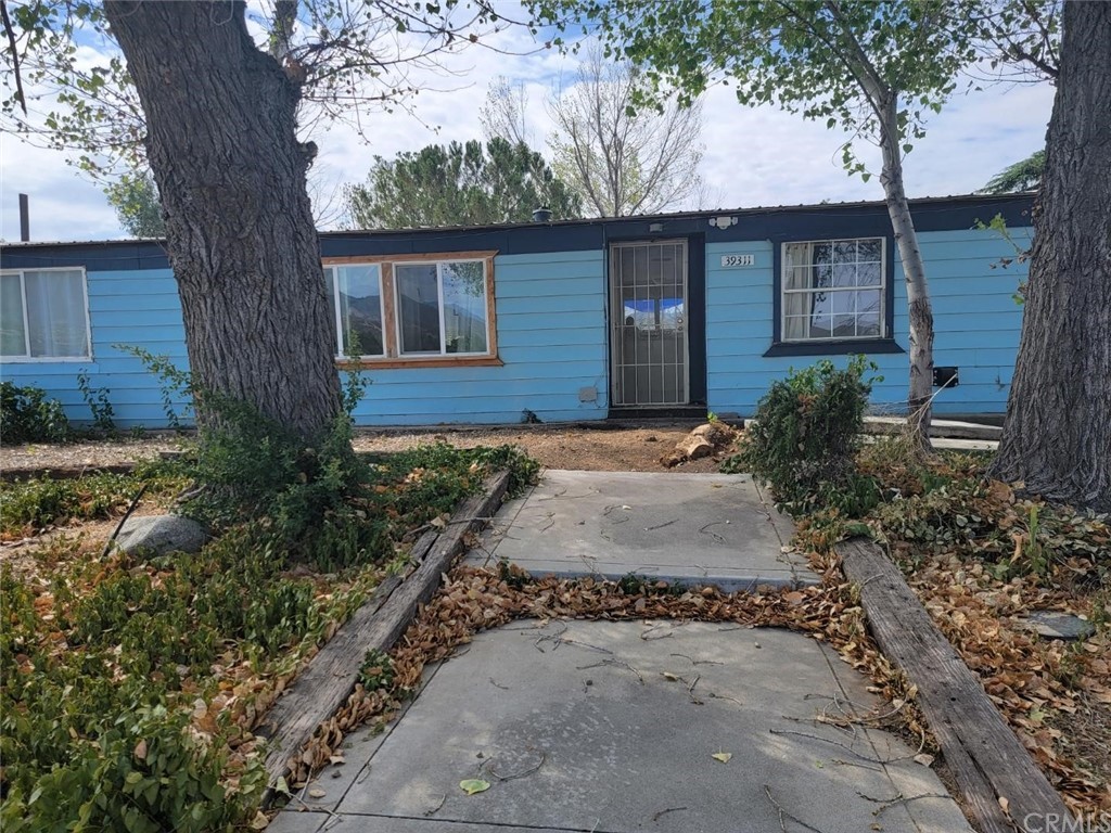 39311 Howard Road Anza, CA 92539 - Photo 2 of 23 a front view of a house with garden