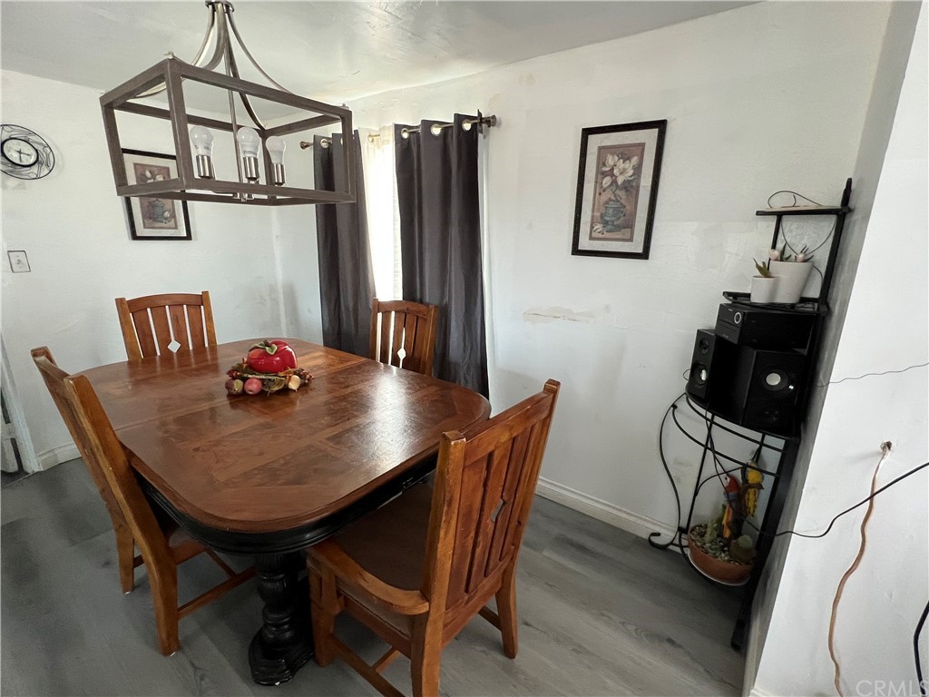 39311 Howard Road Anza, CA 92539 - Photo 4 of 23 a view of a dining room with furniture and a chandelier