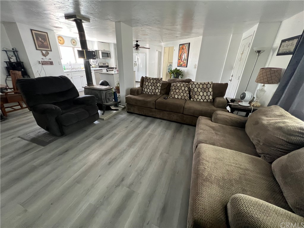 39311 Howard Road Anza, CA 92539 - Photo 9 of 23 a living room with furniture and a couch
