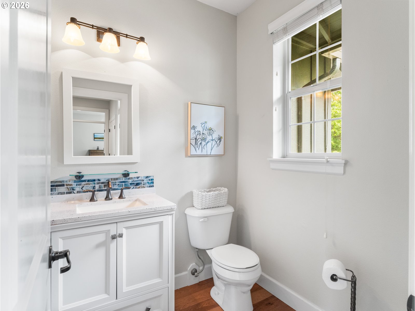 1420 Northwest Goodwin Street Camas, WA 98607 - Photo 11 of 48 a bathroom with a sink mirror toilet and next to a window