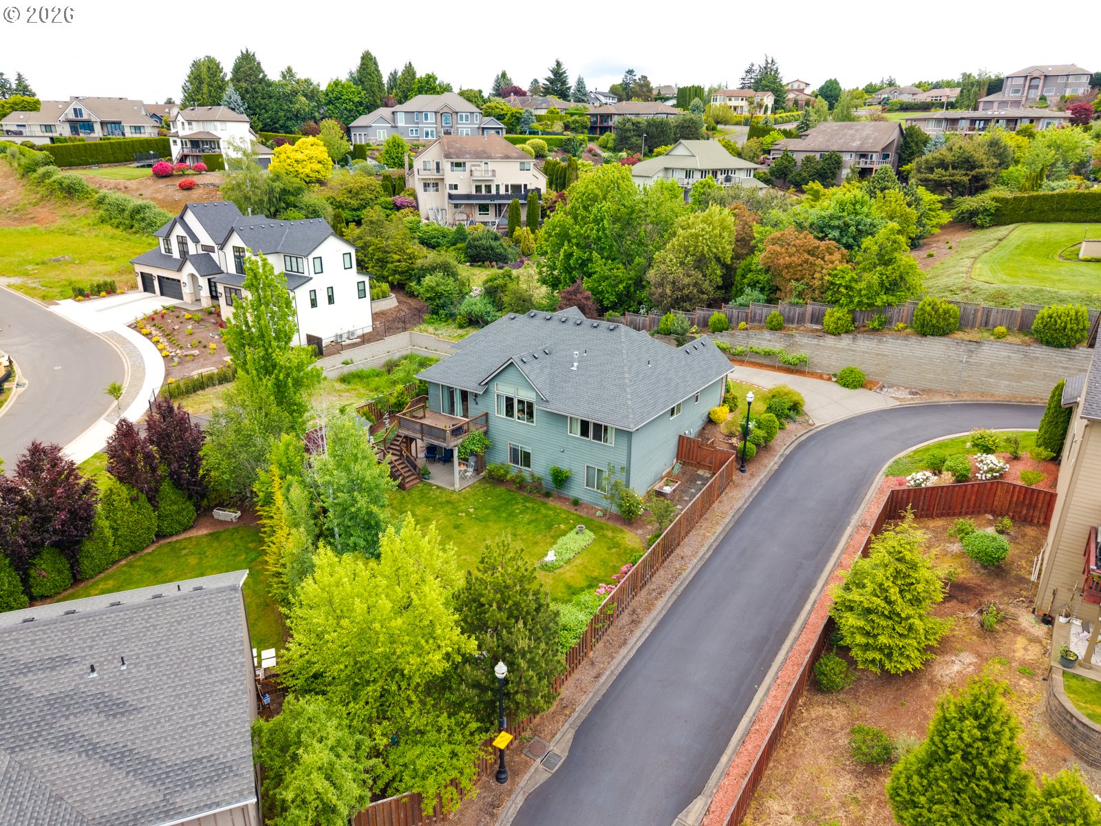 1420 Northwest Goodwin Street Camas, WA 98607 - Photo 46 of 48 an aerial view of a house with a swimming pool yard and lake view