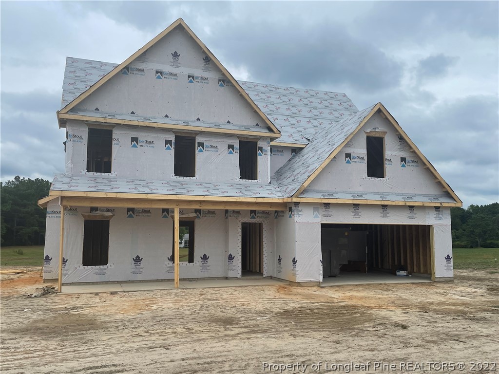 1540 Red Hill Road Carthage, NC 28327 - Photo 1 of 2 a front view of a house with a garage
