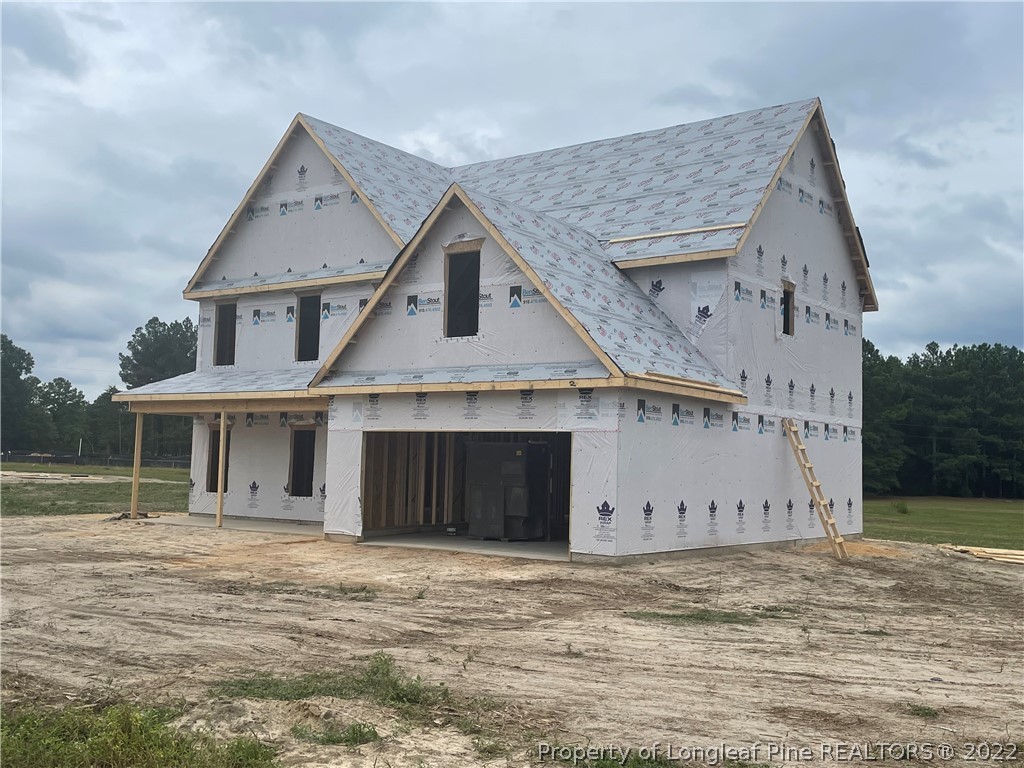 1540 Red Hill Road Carthage, NC 28327 - Photo 2 of 2 a front view of a house with a yard