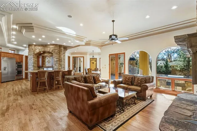 a living room with lots of furniture and a table