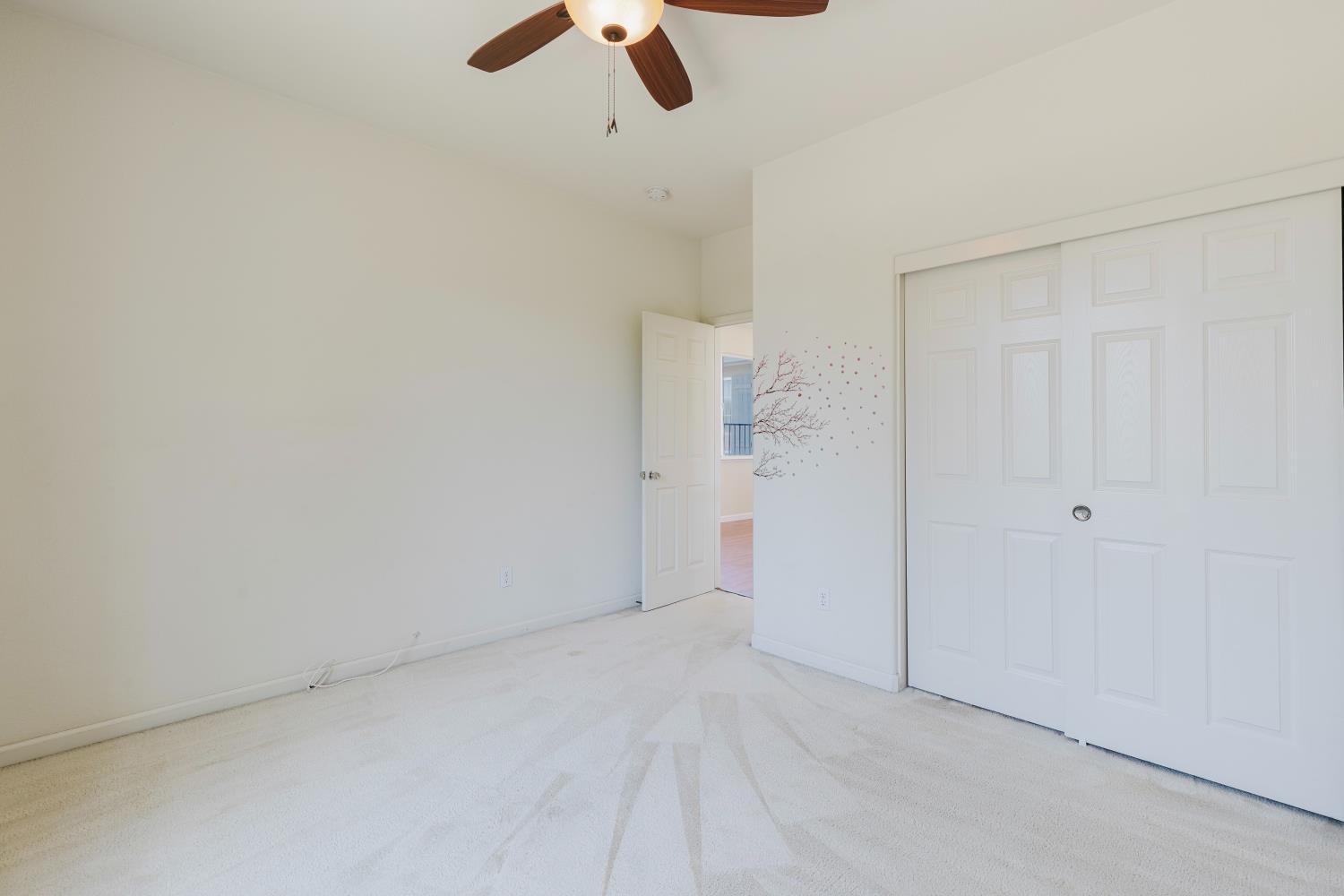 10628 Hidden Grove Circle Stockton, CA 95209 - Photo 22 of 41 a view of an empty room