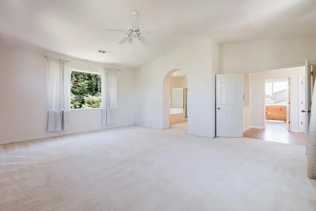 an empty room with windows