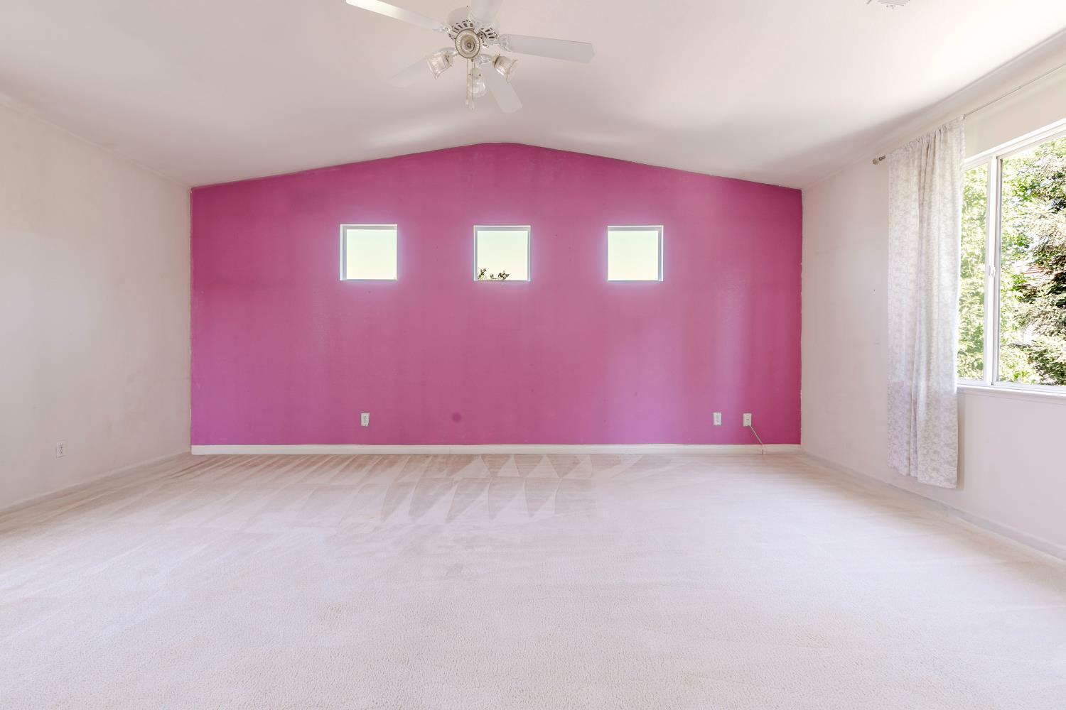 10628 Hidden Grove Circle Stockton, CA 95209 - Photo 30 of 41 an empty room with windows