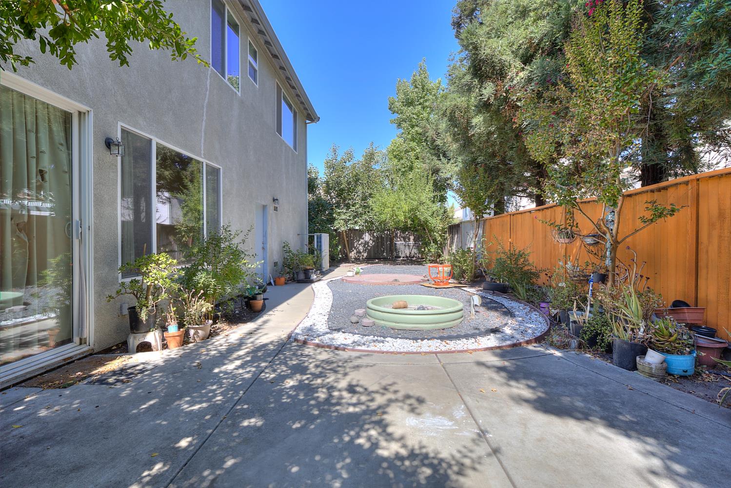 10628 Hidden Grove Circle Stockton, CA 95209 - Photo 38 of 41 a view of a house with a yard