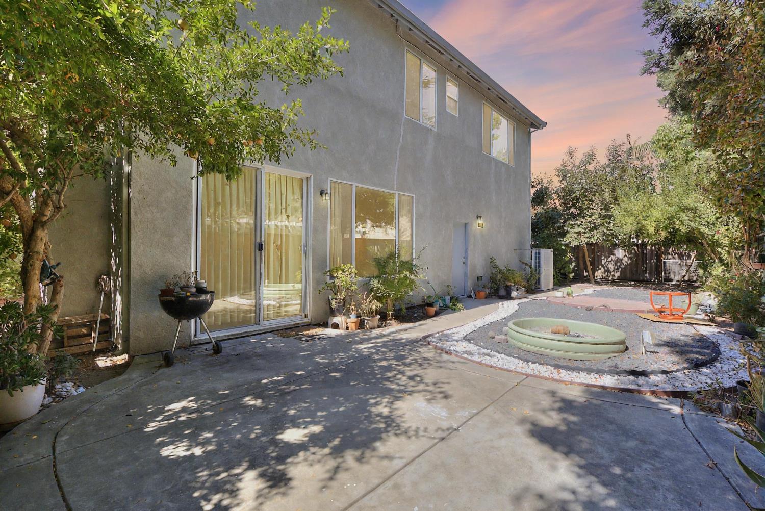 10628 Hidden Grove Circle Stockton, CA 95209 - Photo 41 of 41 a front view of a house with a yard
