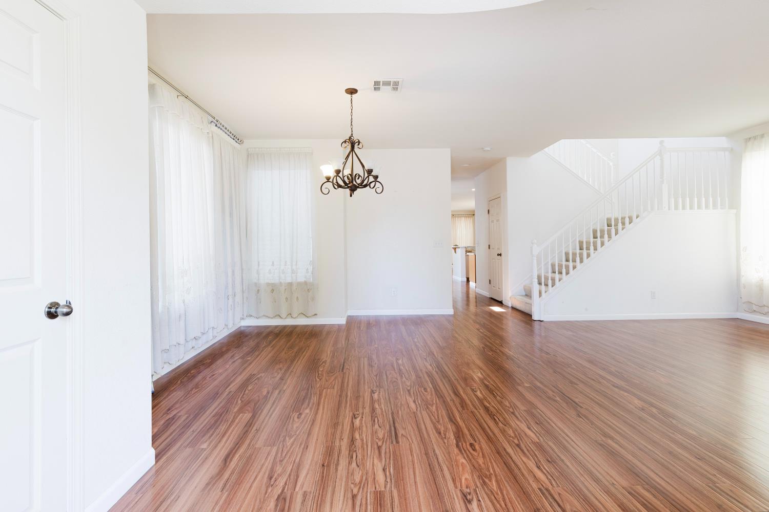 10628 Hidden Grove Circle Stockton, CA 95209 - Photo 5 of 41 a view of empty room with wooden floor