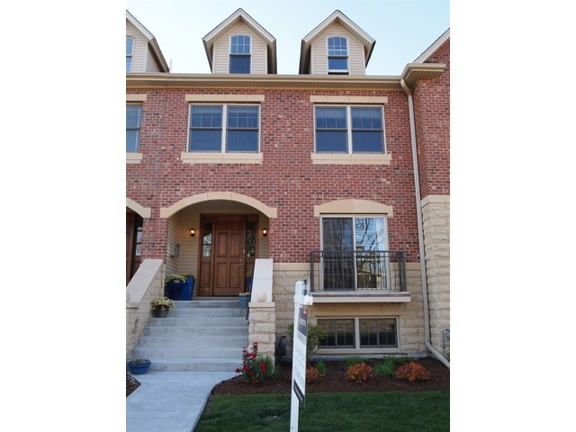 21 North Herbert Road, Unit F Riverside, IL 60546 - Photo 1 of 21 a front view of a house
