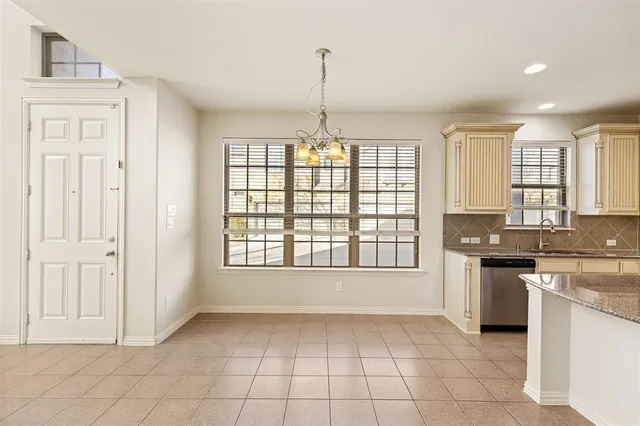 a view of a kitchen with a stove cabinets and a kitchen