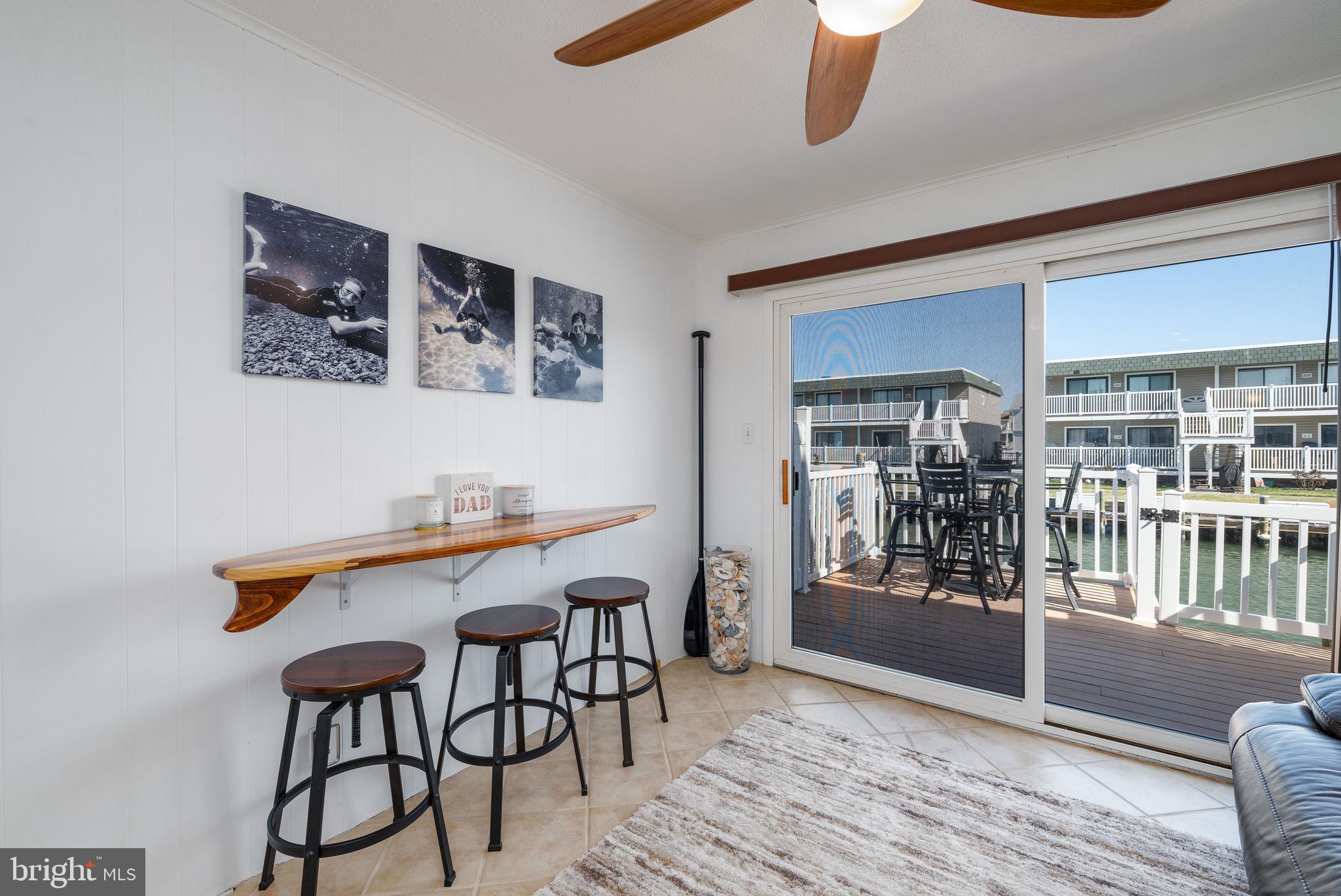 720 Rusty Anchor Road, Unit 41C Ocean City, MD 21842 - Photo 11 of 32 a view of a dining room with furniture
