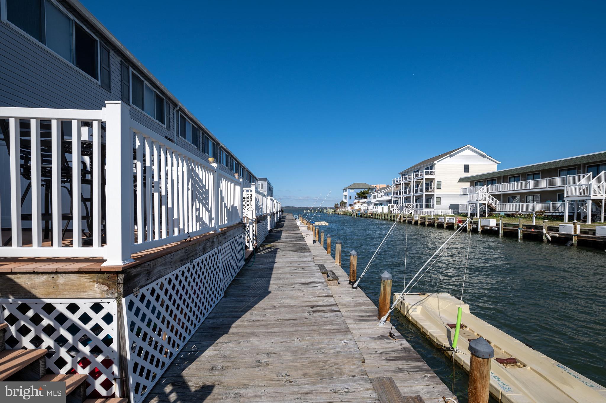 720 Rusty Anchor Road, Unit 41C Ocean City, MD 21842 - Photo 14 of 32 a view of balcony and dining room