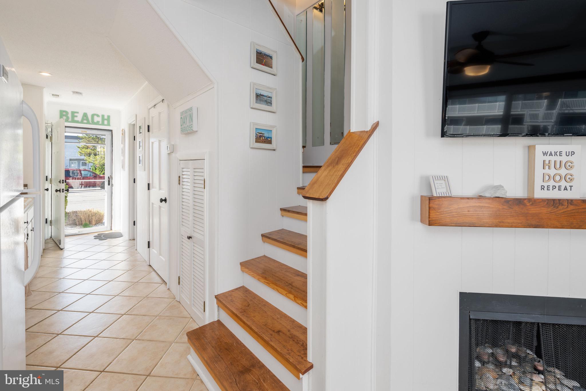 720 Rusty Anchor Road, Unit 41C Ocean City, MD 21842 - Photo 17 of 32 a view of a livingroom with wooden floor and furniture