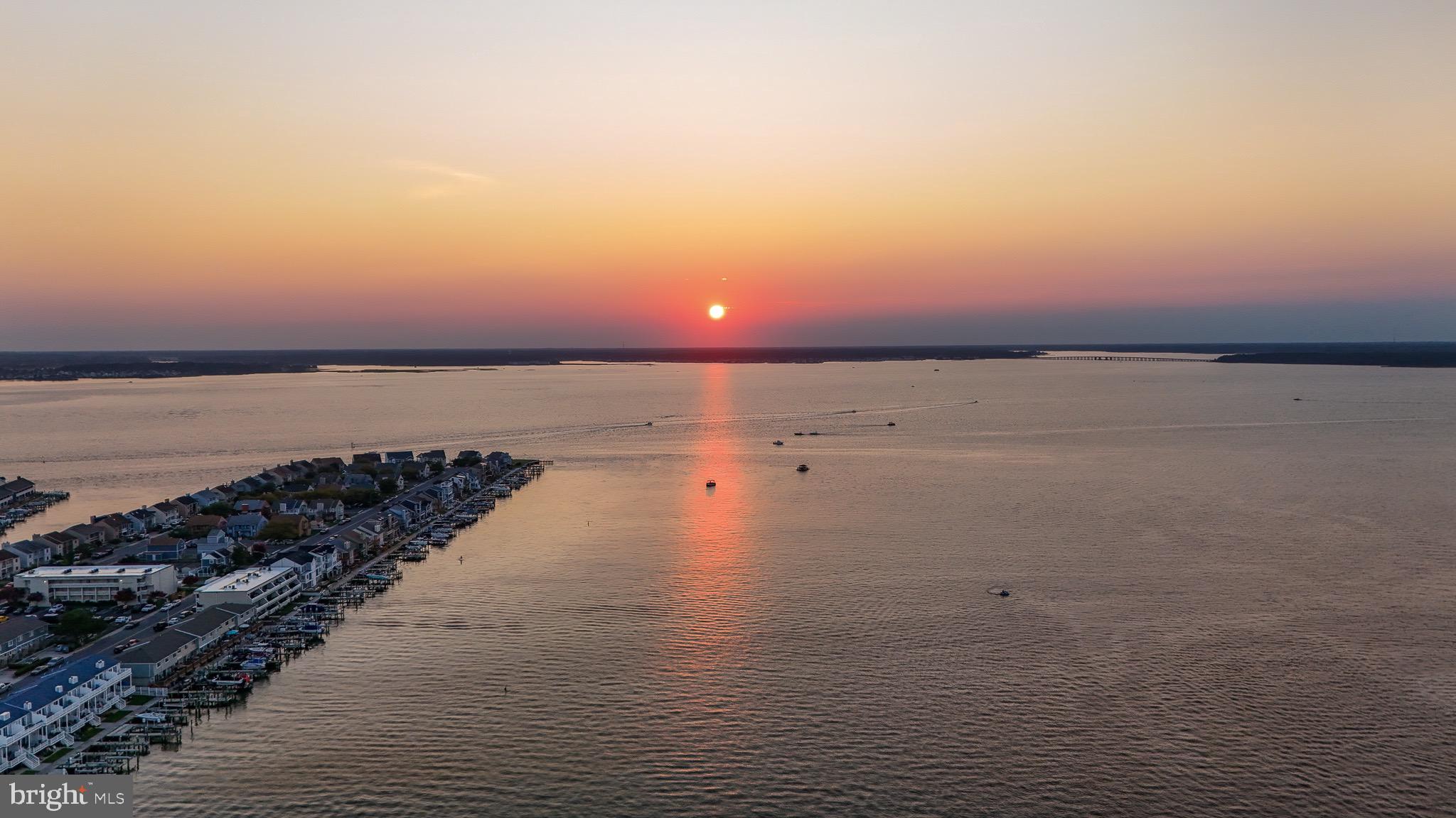 720 Rusty Anchor Road, Unit 41C Ocean City, MD 21842 - Photo 28 of 32 a view of an ocean beach and beach