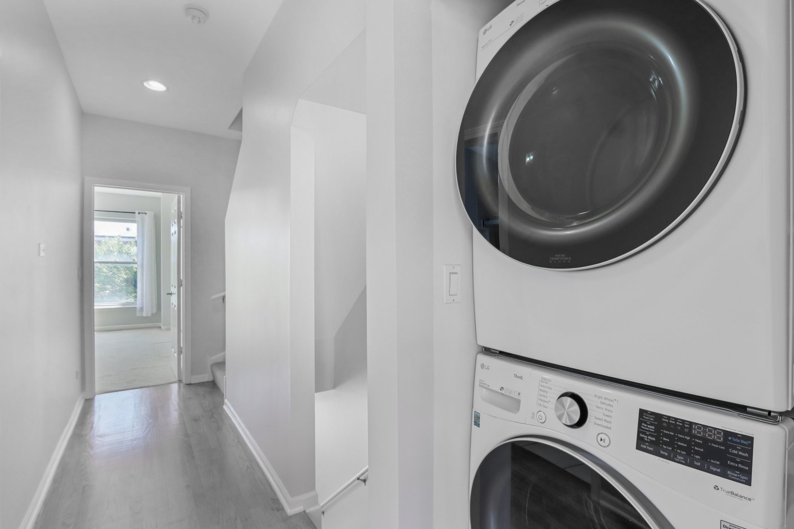 1512 South Halsted Street Chicago, IL 60608 - Photo 22 of 35 a view of a storage and utility room with washer and dryer