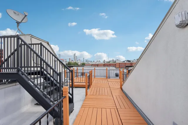 a view of a street with cars on city street