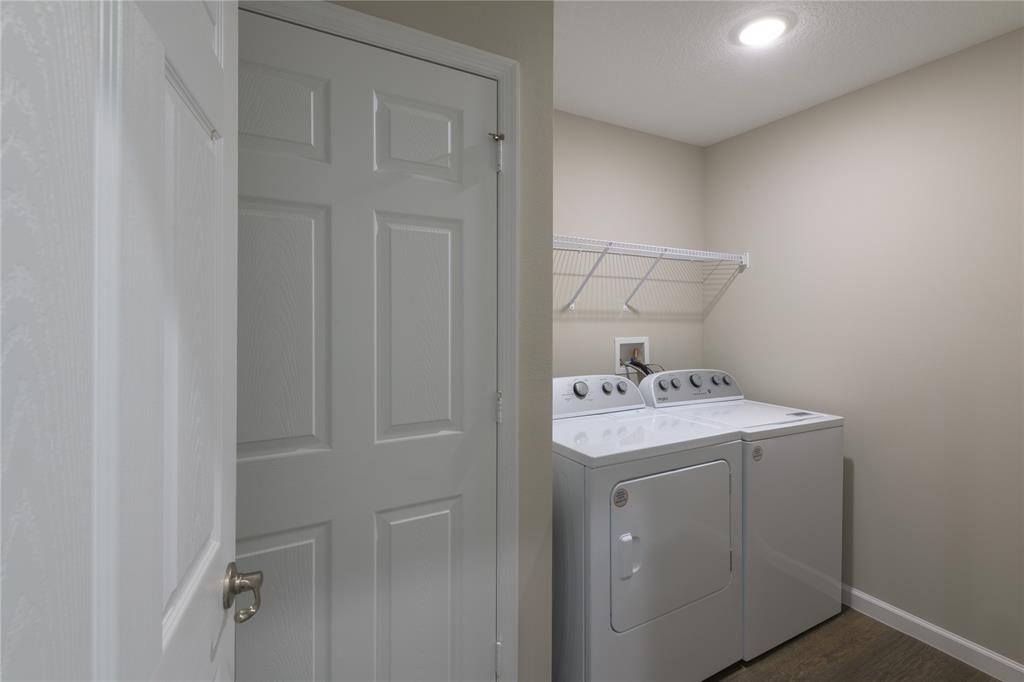 730 Southwest McCall Road Port St. Lucie, FL 34953 - Photo 25 of 28 a utility room with dryer and washer