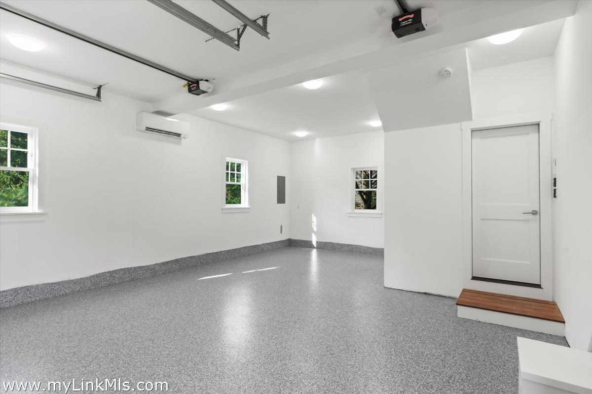 3 Tautemo Way Nantucket, MA 02554 - Photo 56 of 57 an empty room with windows and ceiling fan