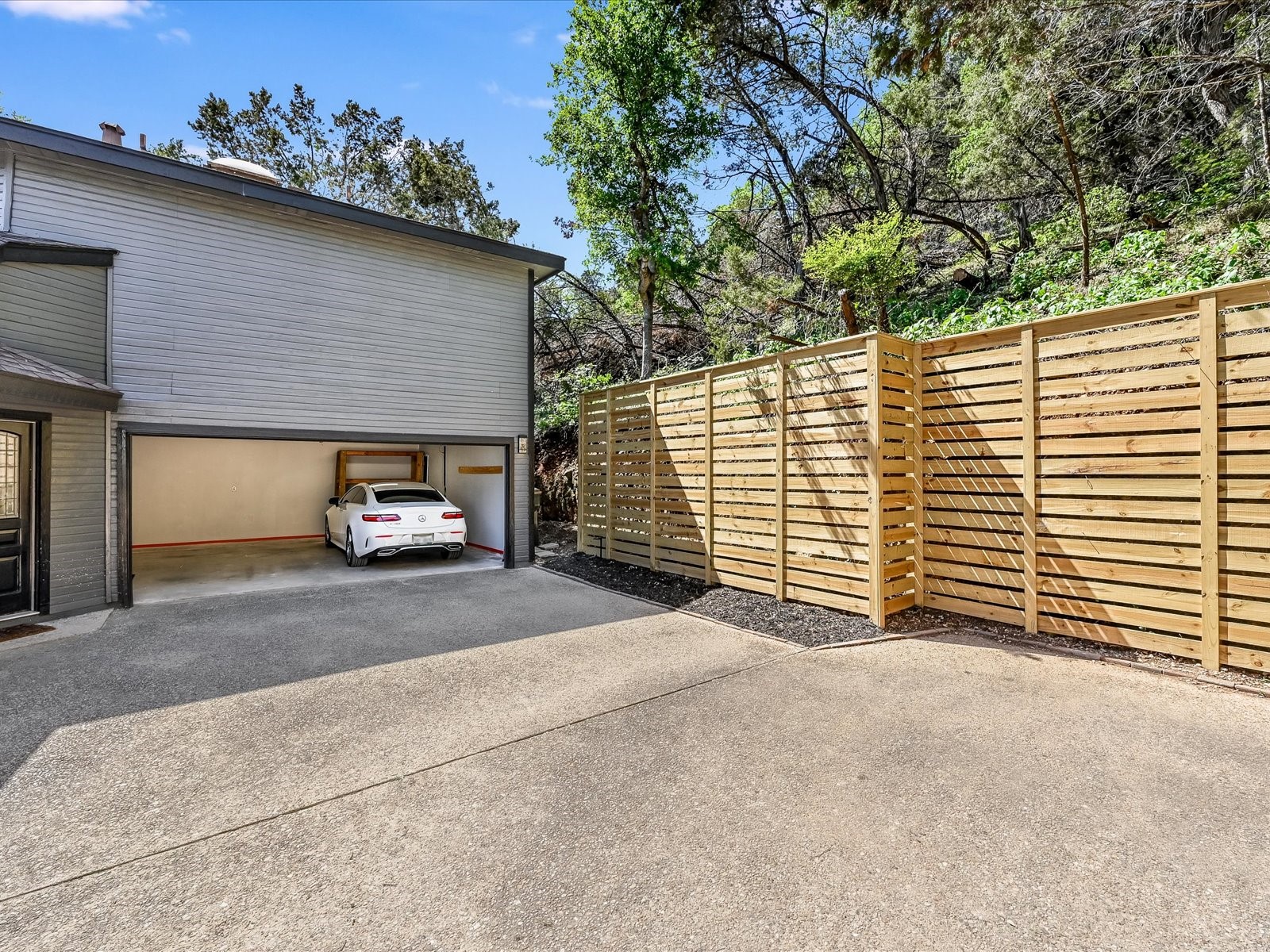 2712 Geronimo Trail Austin, TX 78734 - Photo 22 of 31 a view of a car parked front of a house