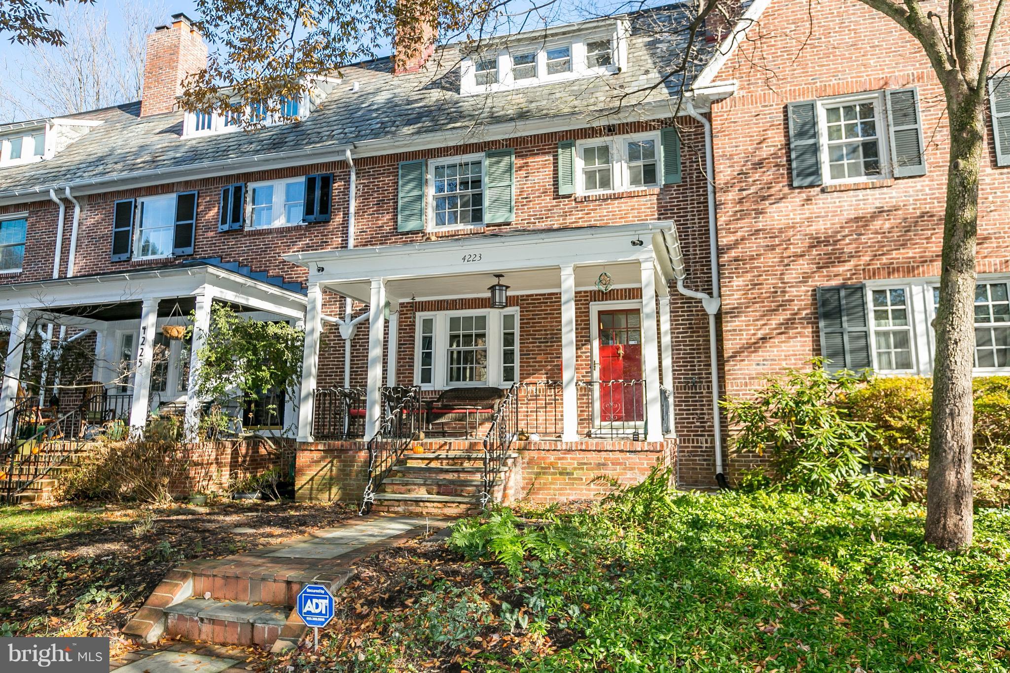 4223 Wickford Road Baltimore, MD 21210 - Photo 1 of 36 front view of a brick house with a small yard