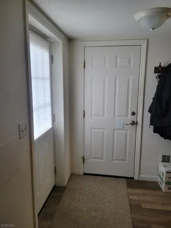 a view of a closet area with hallway