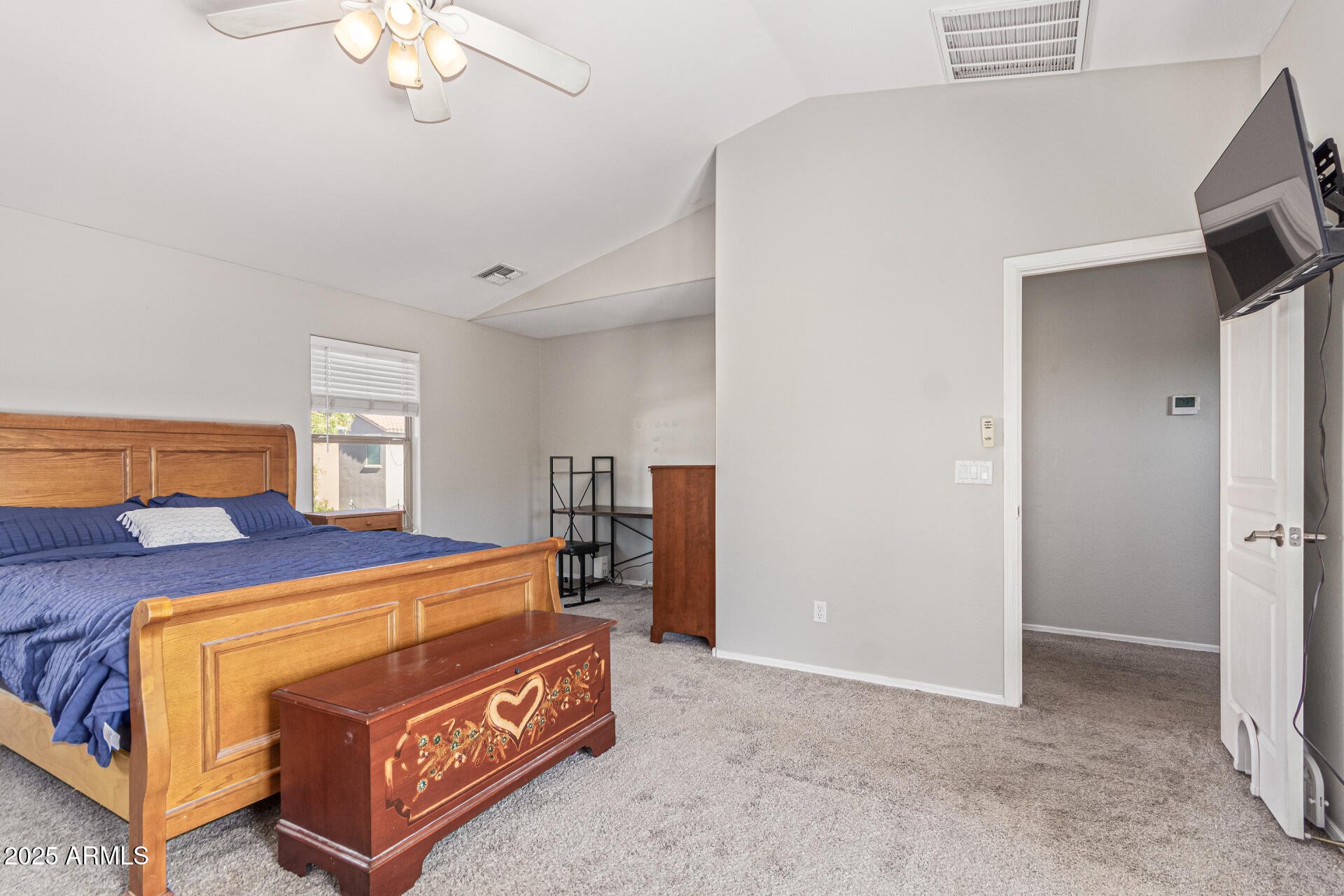 3802 East Chickadee Road Gilbert, AZ 85297 - Photo 14 of 29 a view of a bedroom with furniture