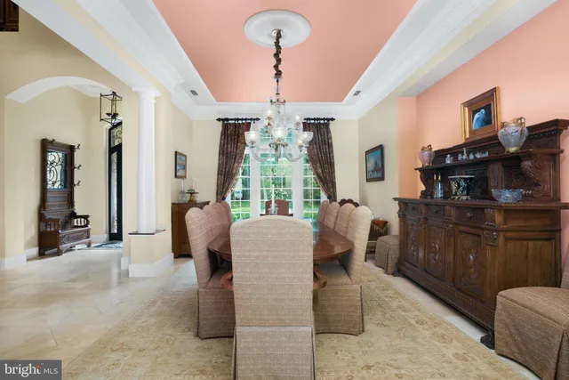 a kitchen with stainless steel appliances granite countertop a sink a stove and a wooden floors