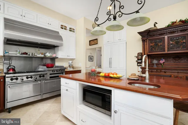 a view of a storage room with furniture fridge and stairs