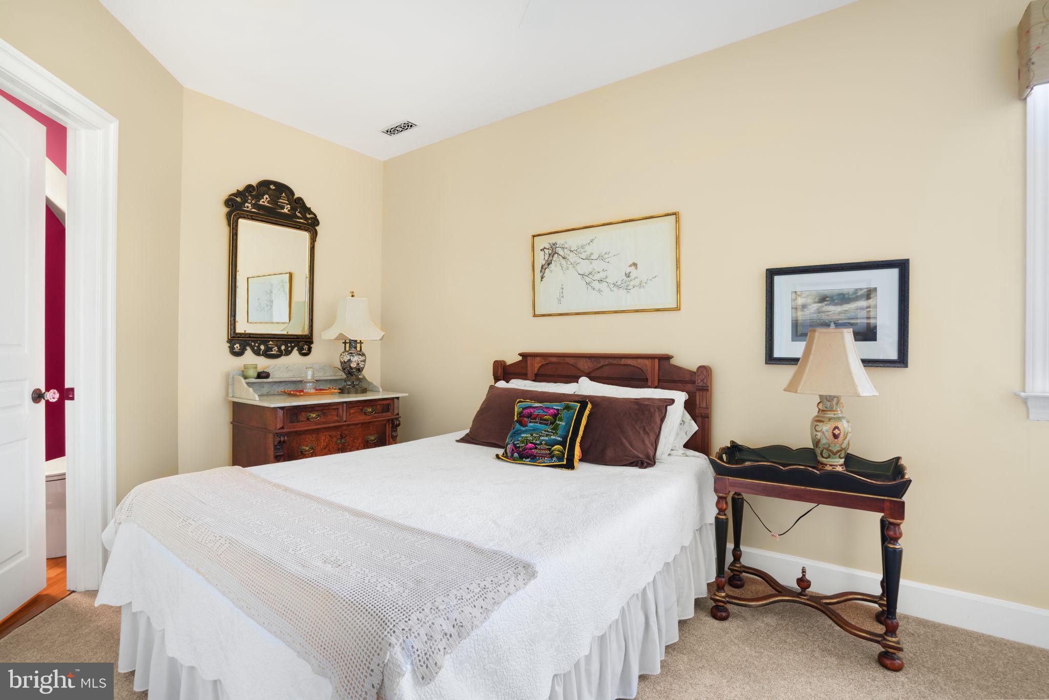 6513 Hampton Road Berlin, MD 21811 - Photo 57 of 129 a bedroom with a bed and a desk